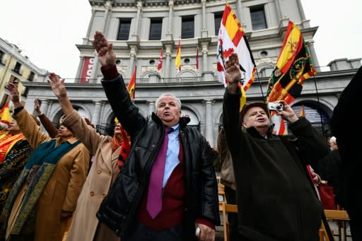 Far-right group Falange members perform the fascist salute during a demonstration marking Franco's death anniversary