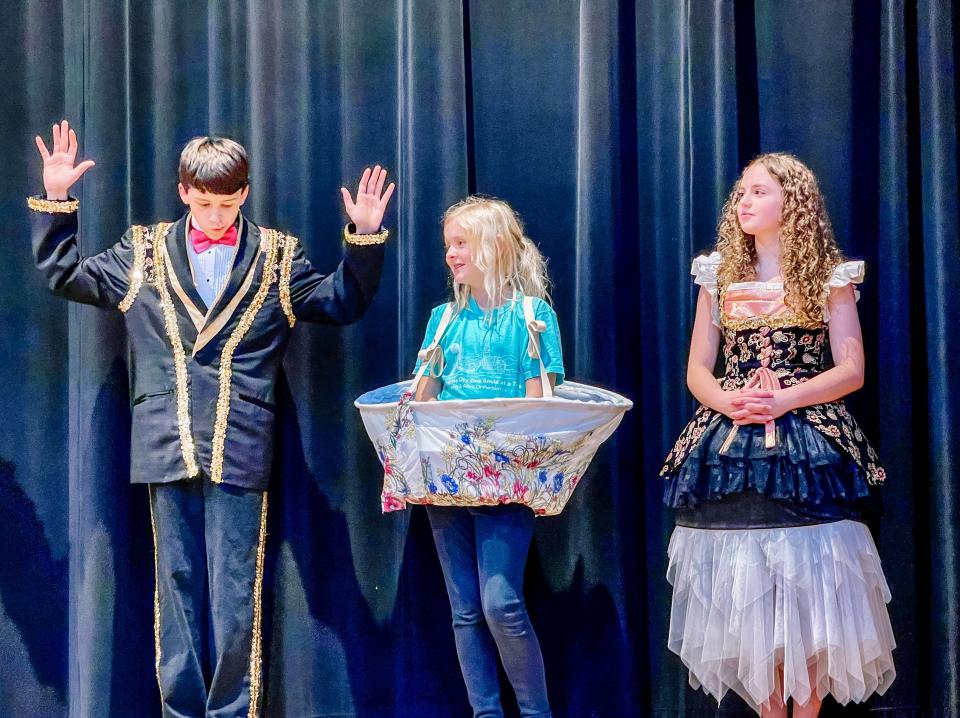 Cast members for “Beauty and the Beast Jr.” rehearse. From left: Gideon Walker as Lumiere, Clara Teglas as Chip and Addie Least as Babette.