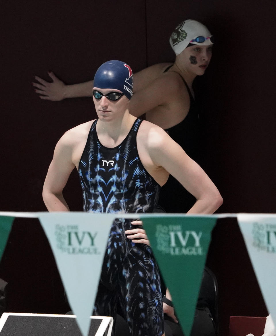 Penn's Lia Thomas waits to compete in a qualifying heat of the 500 yard freestyle event at the Ivy League Women's Swimming and Diving Championships at Harvard University, Thursday, Feb. 17, 2022, in Cambridge, Mass. Thomas, who is transitioning to female, is swimming for the University of Pennsylvania's women's team. (AP Photo/Mary Schwalm)