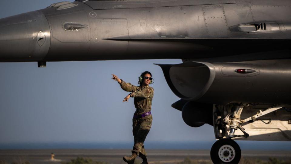 U.S. Air Force Senior Airman Nathalie Olarte, crew chief, launches an F-16 Fighting Falcon from an undisclosed location within the U.S. Central Command area of responsibility Jan. 14, 2024. (Tech. Sgt. Alexander Cook/Air Force)
