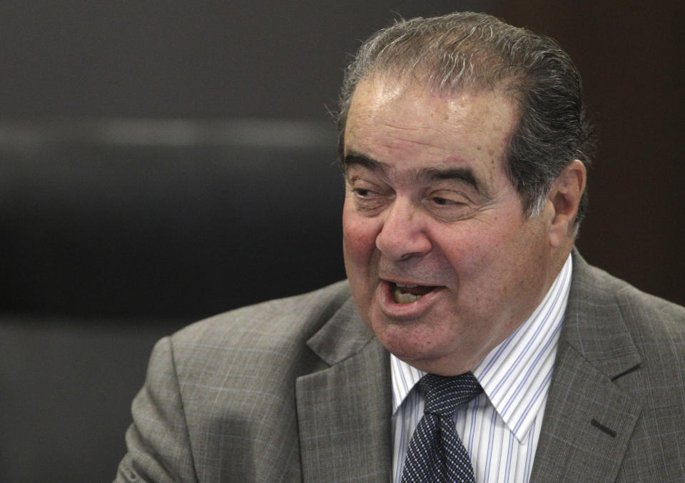 Supreme Court Justice Antonin Scalia speaks during a ceremony naming a courtroom at The John Marshall Law School after former Supreme Court Justice Arthur J. Goldberg Friday, Sept. 28, 2012 in Chicago. (AP Photo/M. Spencer Green)