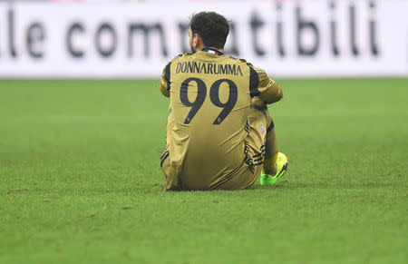 Football Soccer - AC Milan v Napoli - Italian Serie A - San Siro stadium, Milan, Italy - 21/01/17 - AC Milan's goalkeeper Gianluigi Donnarumma reacts. REUTERS/Alberto Lingria