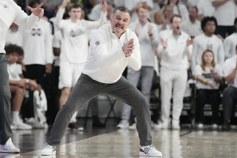 Mississippi State head coach Chris Jans urges his players during the second half of an NCAA college basketball game against Kentucky, Tuesday, Feb. 27, 2024, in Starkville, Miss. Kentucky won 91-89. (AP Photo/Rogelio V. Solis)