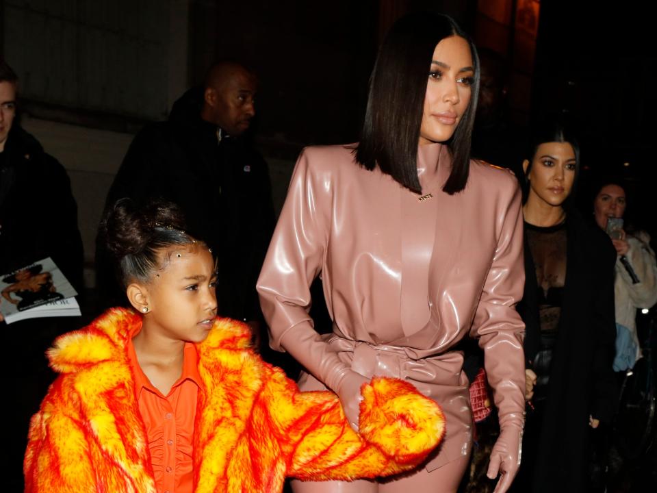 Kim Kardashian and daughter North West arrive at the Ferdi restaurant in March 2021.