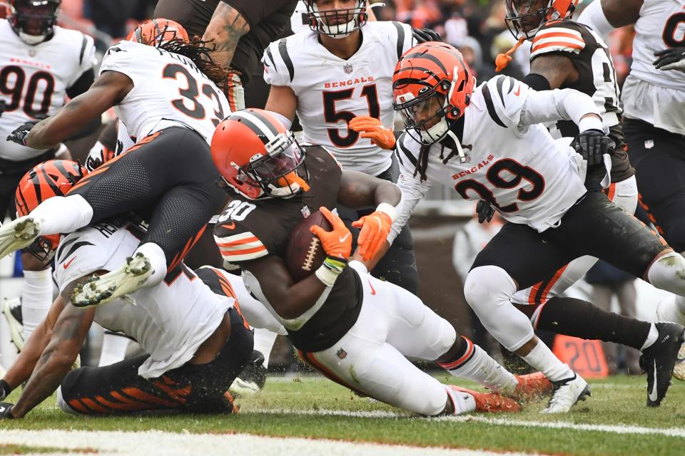 Cleveland Browns running back D'Ernest Johnson scores a 4-yard touchdown during the first half of an NFL football game against the Cincinnati Bengals, Sunday, Jan. 9, 2022, in Cleveland. (AP Photo/Nick Cammett)