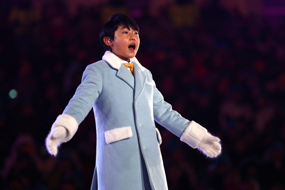 Singer Oh Yeon-joon performs the Olympic Anthem.