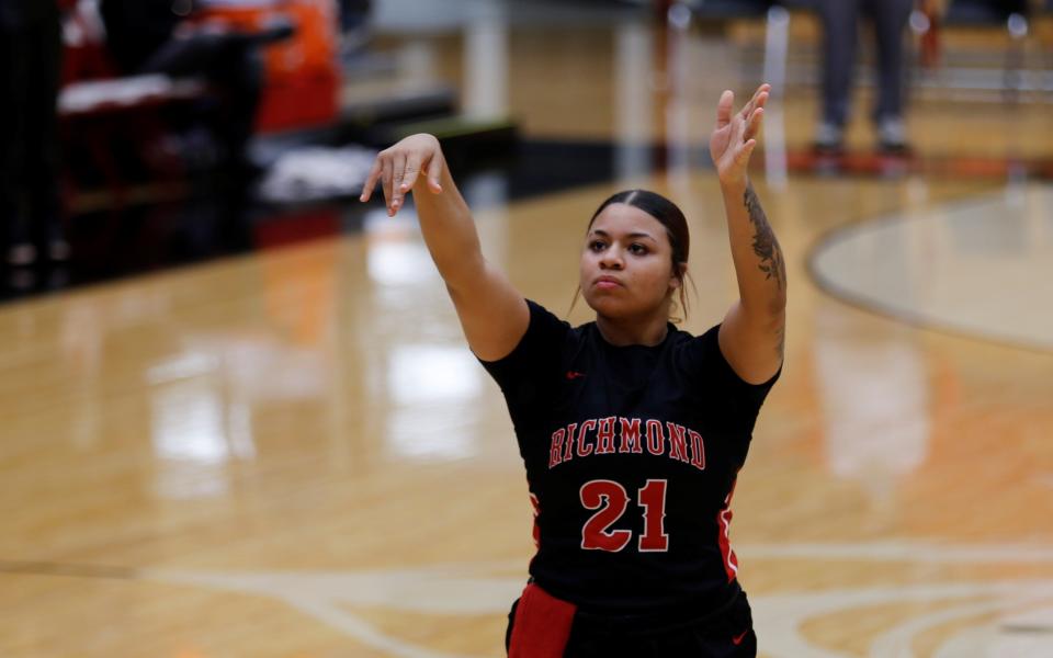 Richmond senior Jakaia Lotz shoots a free throw during warmups before a game against Arsenal Tech Dec. 17, 2021. Lotz had 11 points against the Titans.