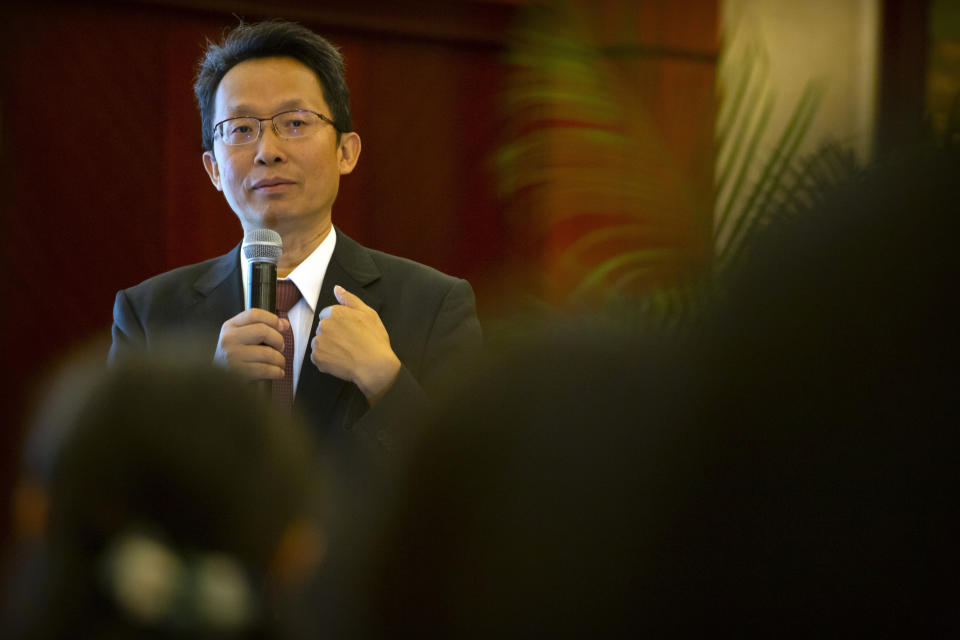 Dr. Fan Bifa, director of the pain clinic at the China-Japan Friendship Hospital in Beijing, speaks at a medical conference in Beijing, China on May 23, 2019. Fan told The Associated Press he has never taken money directly from Mundipharma. (AP Photo/Mark Schiefelbein)