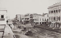 A view of Old Court House Street in Calcutta (Kolkata), India, 1865. St Andrew's Church can be seen at the end of the street (left). Vintage albumen print. (Photo by Samuel Bourne/Hulton Archive/Getty Images)