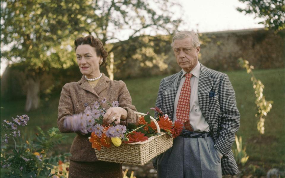 The Duke of Windsor and his wife Wallis Simpson in the garden of Villa Windsor, near Paris