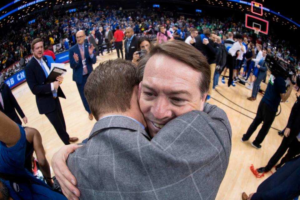 Saint Louis University men’s basketball coach and former Kentucky Wildcats point guard Travis Ford, facing forward, hugged his nephew and assistant coach Ford Stuen after the Billikens won the 2019 Atlantic 10 Conference Tournament championship. Stuen died May 11 at age 29 after falling ill with what Travis Ford says began as “a severe liver issue.”