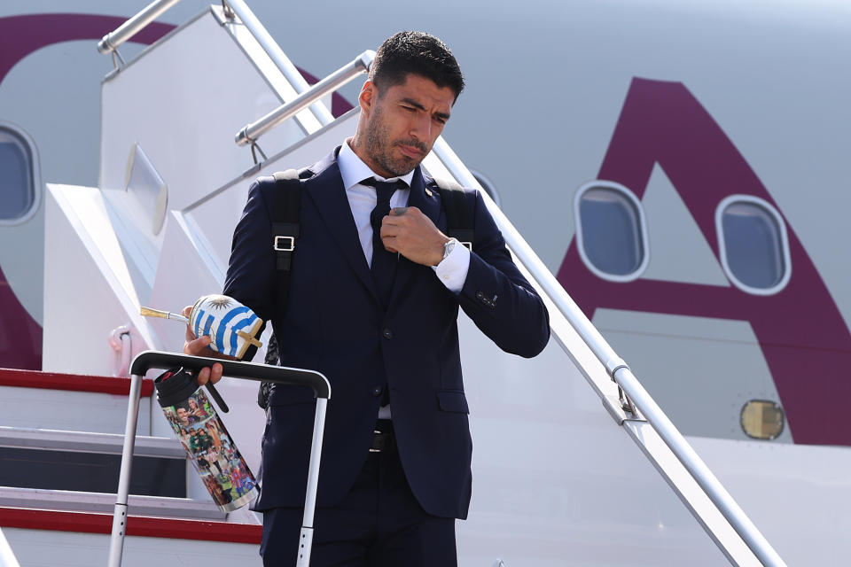 DOHA, QATAR - NOVEMBER 19: Luis Suarez of Uruguay disembarks a Qatar Airways flight ahead of the FIFA World Cup Qatar 2022 at Hamad International Airport Special Events Terminal on November 19, 2022 in Doha, Qatar. (Photo by Maddie Meyer - FIFA/FIFA via Getty Images)