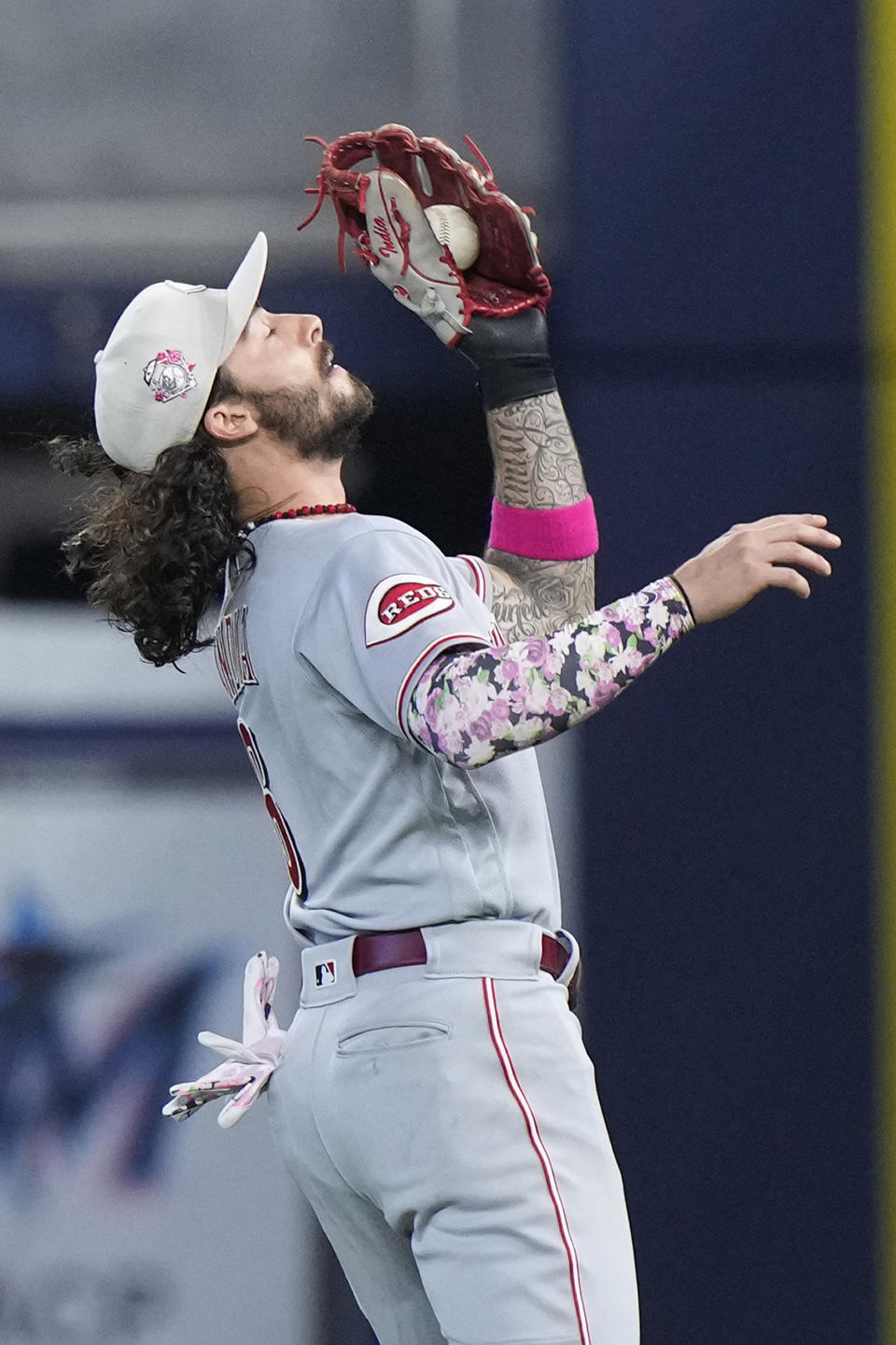 Cincinnati Reds second baseman Jonathan India catches a ball hit by Miami Marlins' Jon Berti during the eighth inning of a baseball game, Sunday, May 14, 2023, in Miami. (AP Photo/Wilfredo Lee)