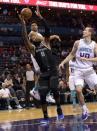 Dec 12, 2018; Charlotte, NC, USA; Detroit Pistons forward center Andre Drummond (0) gets a rebound from Charlotte Hornets guard forward Jeremy Lamb (3) and forward center Cody Zeller (40) during the first half at the Spectrum Center. Mandatory Credit: Sam Sharpe-USA TODAY Sports