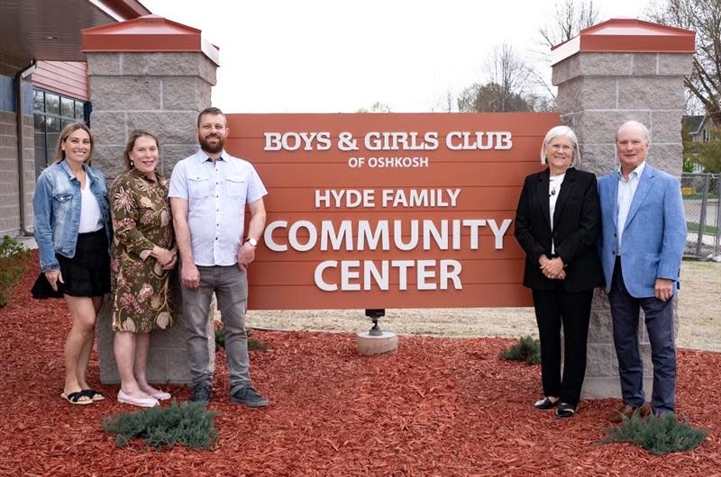 A view outside the newly expanded Boys & Girls Club of Oshkosh. Left side: Sarah Hyde, Chrys Hyde, Andrew Hyde, Peg (Hyde) Wachtel and Doug Hyde.
