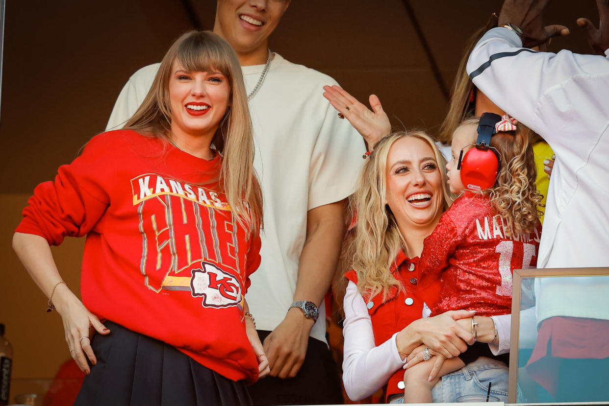 KANSAS CITY, MISSOURI - OCTOBER 22: Taylor Swift and Brittany Mahomes react during a game between the Los Angeles Chargers and Kansas City Chiefs at GEHA Field at Arrowhead Stadium on October 22, 2023 in Kansas City, Missouri. (Photo by David Eulitt/Getty Images)