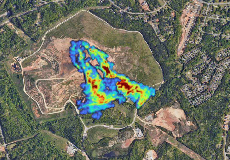 The colored areas show where methane is detected in a landfill surrounded by houses.