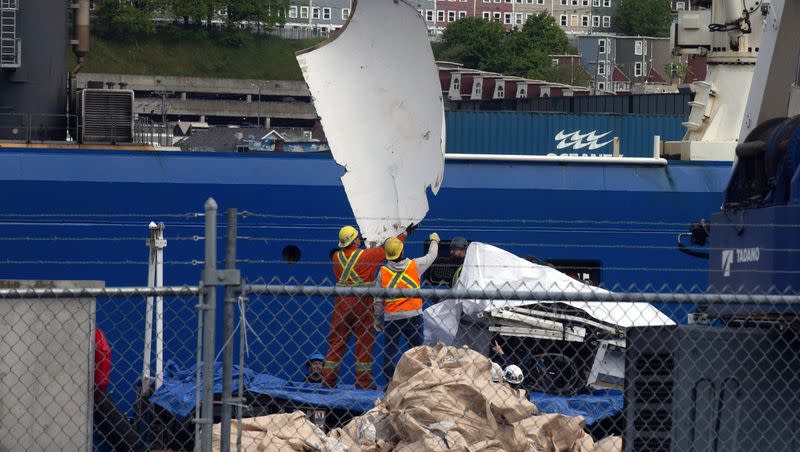 Debris from the Titan submersible, recovered from the ocean floor near the wreck of the Titanic, is unloaded from the ship Horizon Arctic at the Canadian Coast Guard pier in St. John’s, Newfoundland, Wednesday, June 28, 2023.