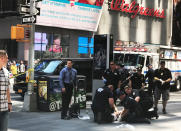 <p>First responders are assisting injured pedestrians after a vehicle struck pedestrians on a sidewalk in Times Square in New York on May 18, 2017. (REUTERS/Jeremy Schultz) </p>