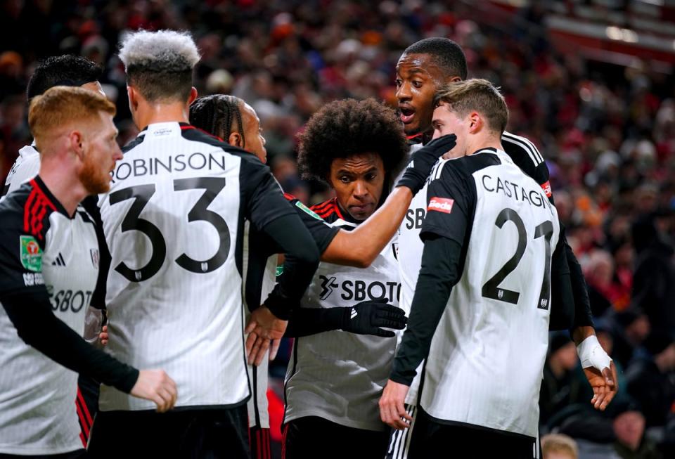 Celebrations: Willian gave Fulham a shock first-half lead against Liverpool at Anfield (PA)