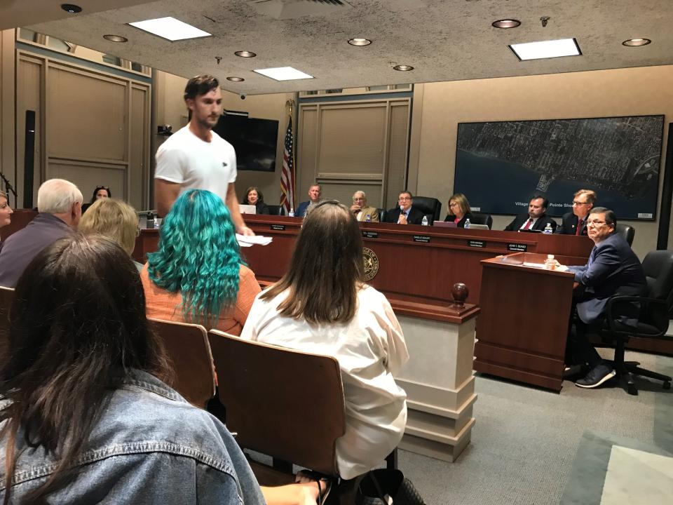 Shane Smith, a resident of Grosse Pointe Shores whose family owns two pit bulls, leaves the lectern at the city council meeting of Sept. 19, 2023, after speaking against a city plan to ban pit bulls.