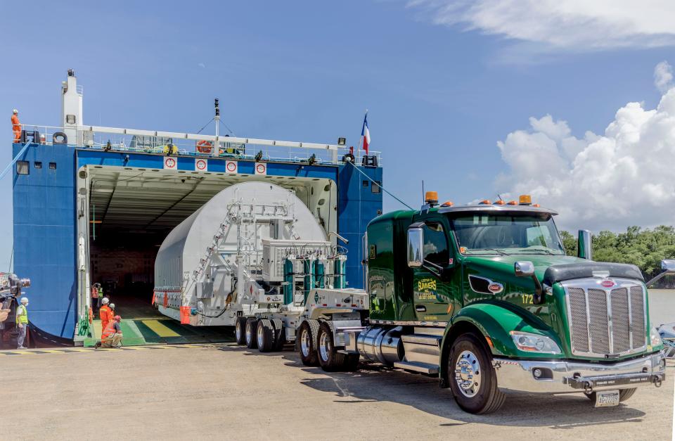 The James Webb Space Telescope, all packed in its shipping container, is unloaded from the MN Colibri. The MN Colibri is the ship that transported Webb from the port in California to the port in French Guiana in October 2021.