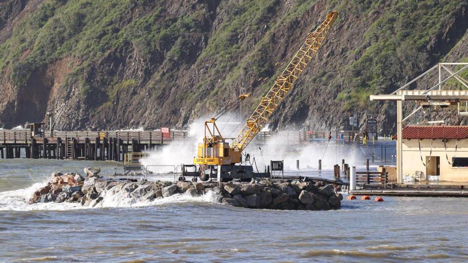 Wind driven waves crash on south facing Port San Luis during a break in the clouds David Middlecamp/dmiddlecamp@thetribunenews.com