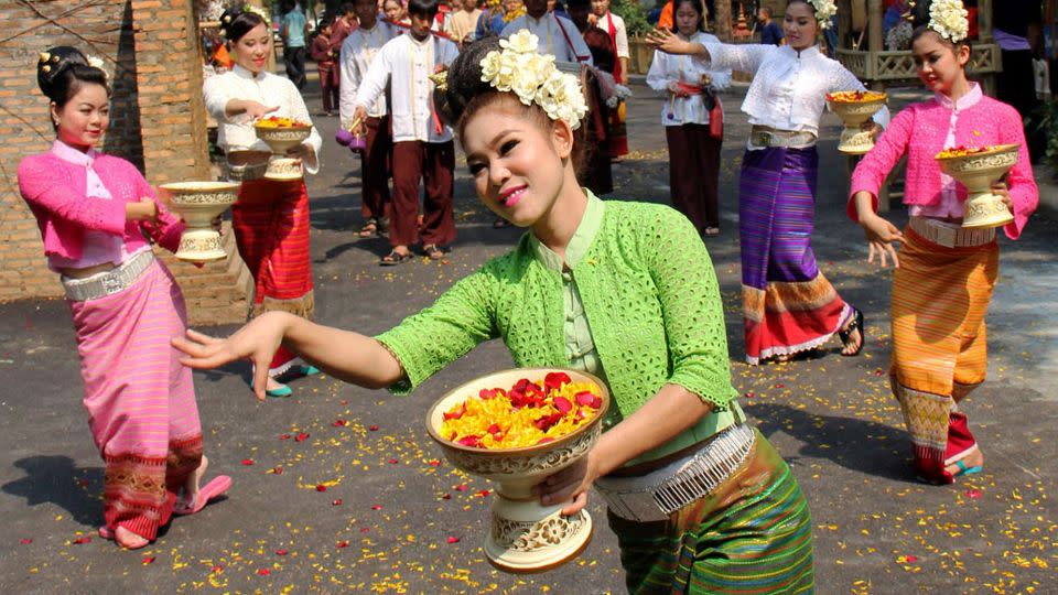 Traditional dancers perform during a Songkran opening ceremony in Chiang Mai province in Thailand's northern region. - Wichai Taprieu/AP