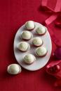 <p>Transform the creamy holiday beverage into bite-sized sweets.</p><p><a href="https://www.womansday.com/food-recipes/food-drinks/recipes/a56923/eggnog-truffles-recipe/" rel="nofollow noopener" target="_blank" data-ylk="slk:Get the recipe.;elm:context_link;itc:0;sec:content-canvas" class="link "><em>Get the recipe. </em></a></p>