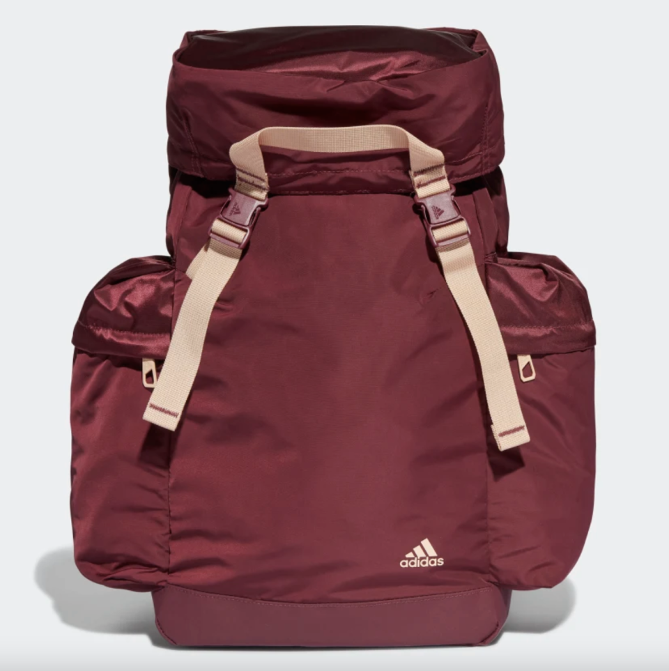 Sports Backpack in red burgundy with light peach details (Photo via Adidas)