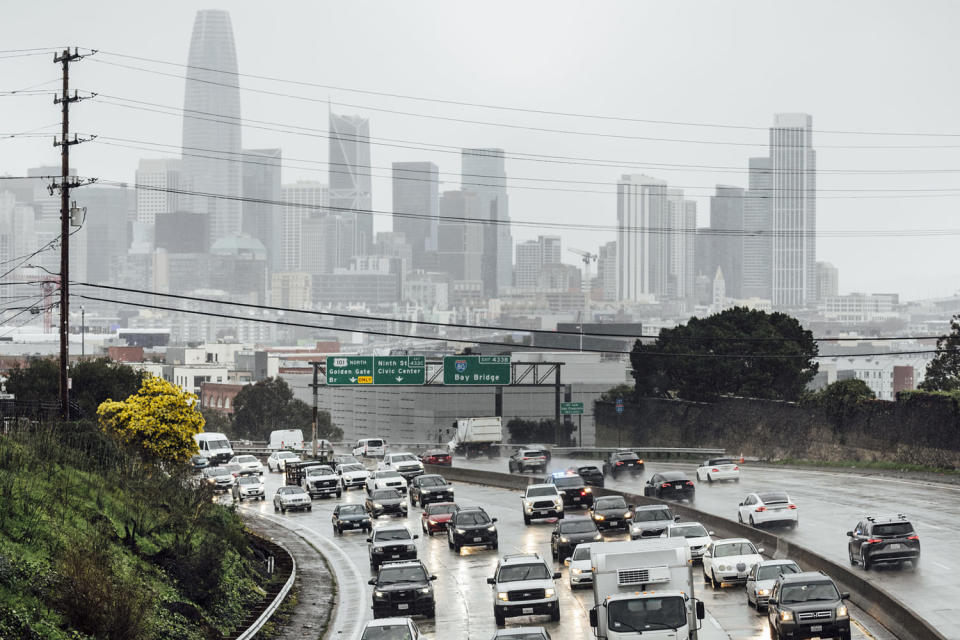 Motorists travel along a rain-soaked U.S. Highway 101 during a storm in San Francisco, Wednesday, Jan. 31, 2024. (Stephen Lam / San Francisco Chronicle via AP)
