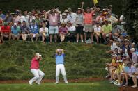 Padraig Harrington of Ireland reacts after missing a hole-in-one on the 9th tee with fellow countryman Shane Lowry (L) during the par 3 event held ahead of the 2015 Masters at Augusta National Golf Course in Augusta, Georgia April 8, 2015. REUTERS/Brian Snyder