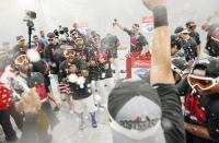 The Texas Rangers celebrate winning AL West Title after their game against the Los Angeles Angels, at Globe Life Park in Arlington, Texas, on October 4, 2015