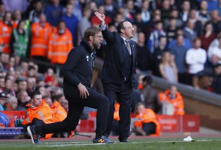 Football Soccer - Liverpool v Newcastle United - Barclays Premier League - Anfield - 23/4/16 Liverpool manager Juergen Klopp and Newcastle manager Rafael Benitez Action Images via Reuters / Lee Smith Livepic