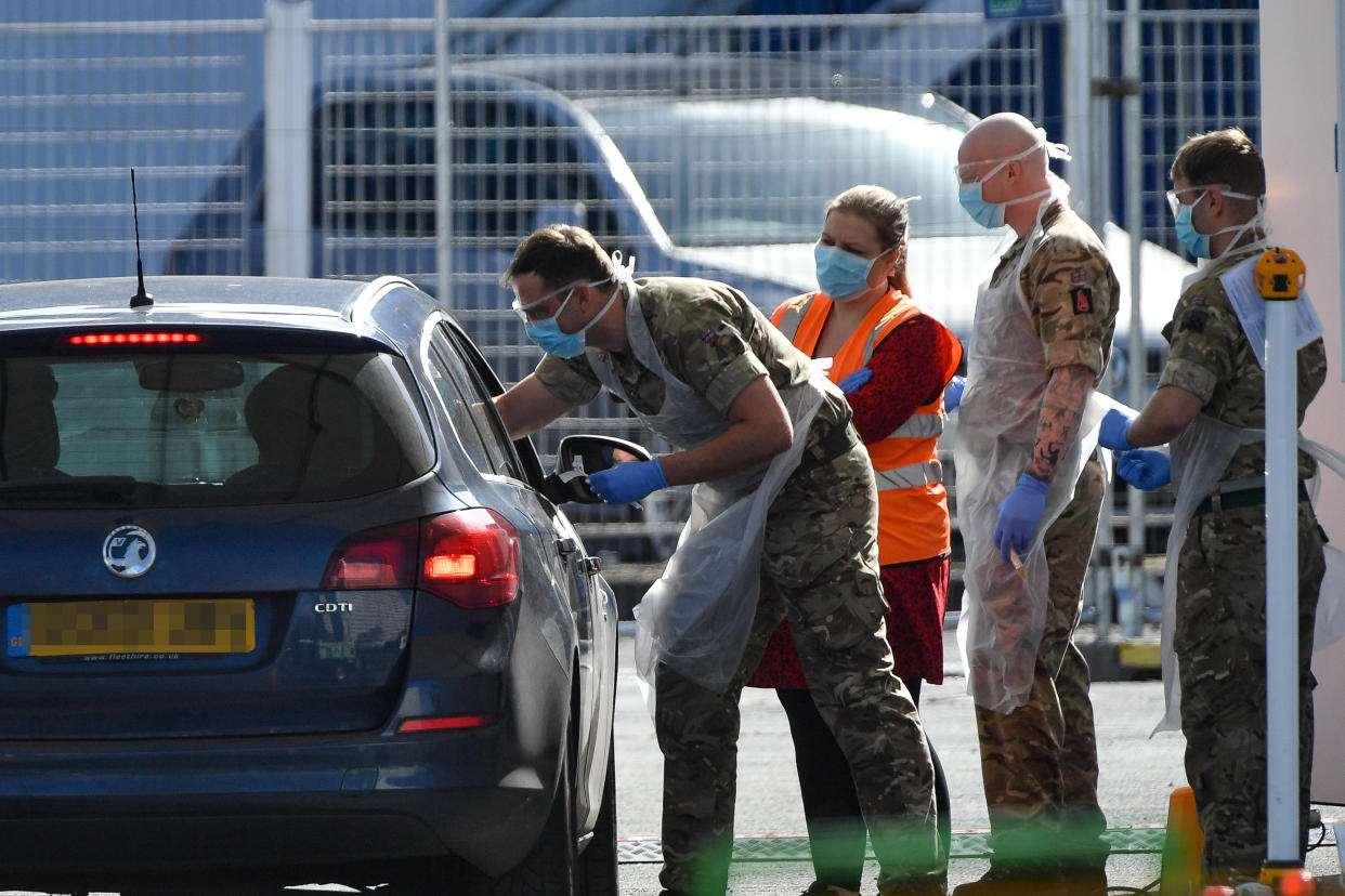 EDITORS NOTE: NUMBER PLATE PIXELATED BY PA PICTURE DESK Picture taken at 1045am of Military personnel help administer Covid19 tests for NHS workers at Edgbaston cricket ground in Birmingham, as the UK continues in lockdown to help curb the spread of the coronavirus.