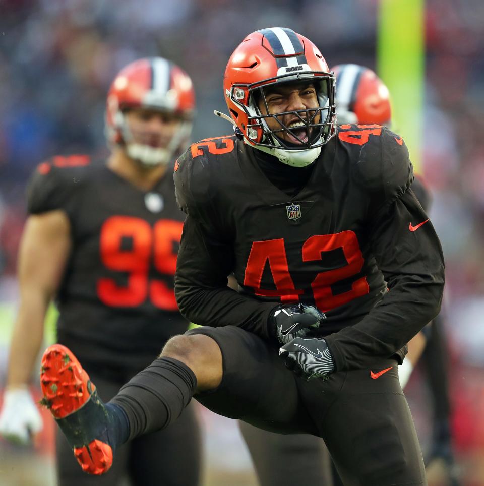 Browns linebacker Tony Fields II celebrates after a second-half stop against the Tampa Bay Buccaneers, Sunday, Nov. 27, 2022, in Cleveland.