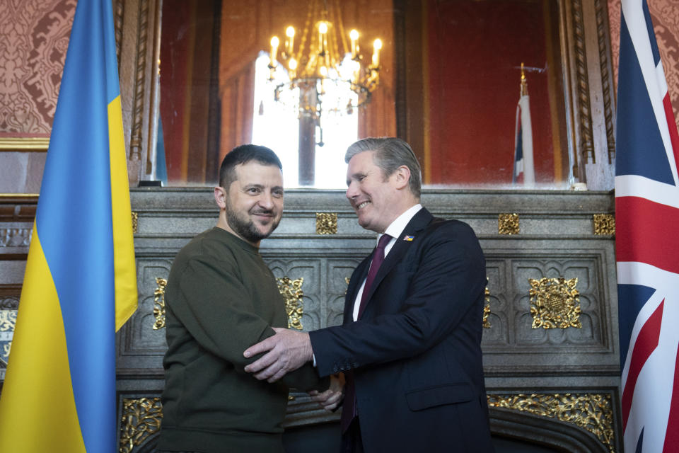 FILE - Labour leader Keir Starmer, right, meets with Ukrainian President Volodymyr Zelenskyy at Speaker's House in the Palace of Westminster, London, during his first visit to the UK since the Russian invasion of Ukraine, Wednesday Feb. 8, 2023. (Stefan Rousseau/pool photo via AP, FIle)