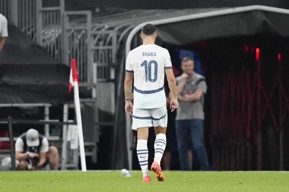 Switzerland's Granit Xhaka leaves the pitch after receiving a red card during the UEFA Nations League League A, Group A4, Matchday 1 football match, Denmark v Switzerland at Parken Stadium in Copenhagen, Denmark on September 5, 2024. (Photo by MADS CLAUS RASMUSSEN/Ritzau Scanpix/AFP via Getty Images)