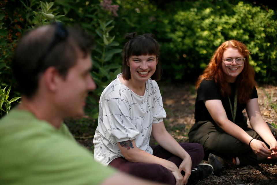 Megan Philpott (center) and Mairead Kennedy (right) of the Center for Conservation and Research for Endangered Wildlife stored samples of Morticia's pollen at different temperatures to test which temperature preserves the pollen the best.