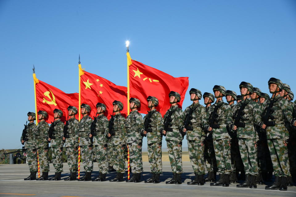 ZHURIHE, CHINA - JULY 30: PLA Soldiers take part in a grand military parade to mark the 90th anniversary of the founding of Chinese People's Liberation Army at Zhurihe training base on July 30, 2017 In Zhurihe, Inner Mongolia Autonomous Region of China. More than 12,000 service personnel from the army, navy, air force, armed police, the newly formed rocket force and strategic support troops, took part in the parade at Zhurihe military training base.  (Photo by VCG/VCG via Getty Images)