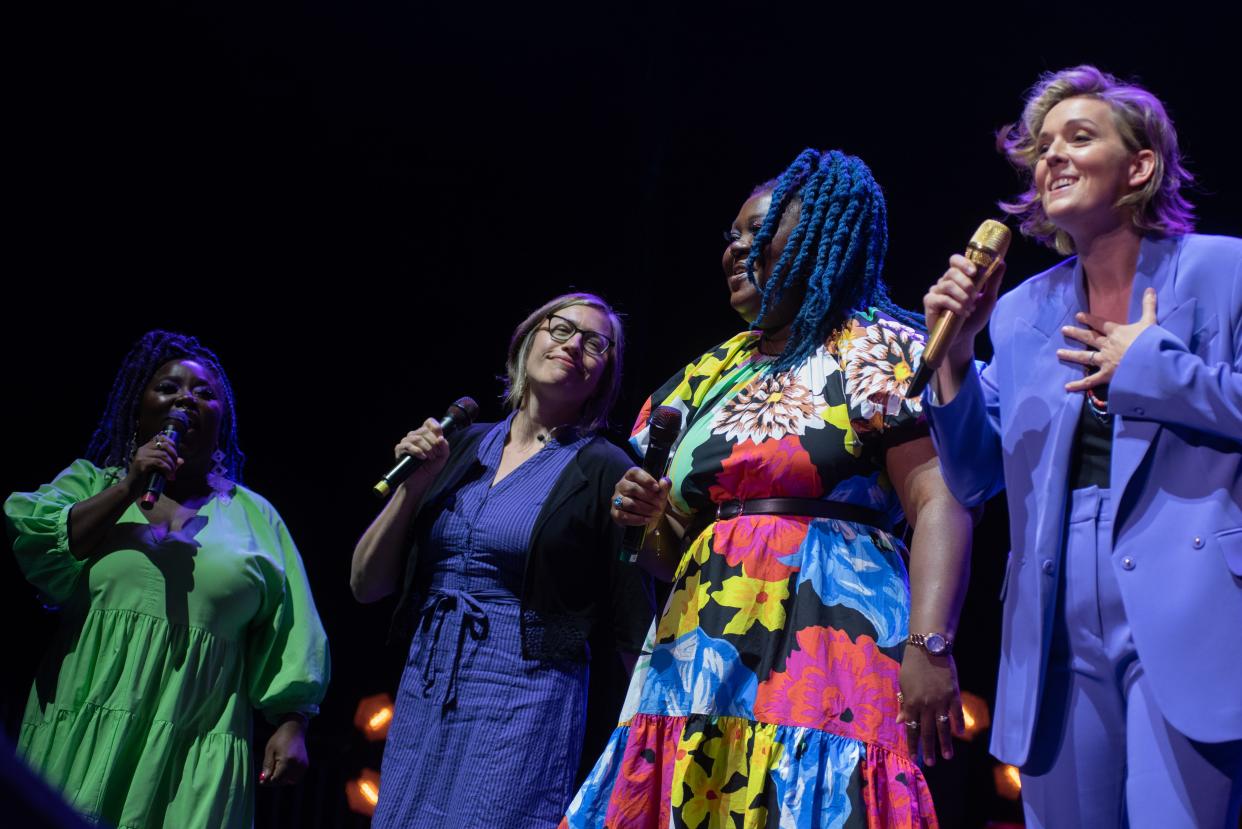 Milwaukee sisters Chauntee (far left) and Monique Ross (second from right) perform with Brandi Carlile (far right) and Kyleen King at Fiserv Forum in Milwaukee on August 5, 2022. The Ross sisters, now based in Nashville with their own band SistaStings, play violin and cello in Carlile's band.