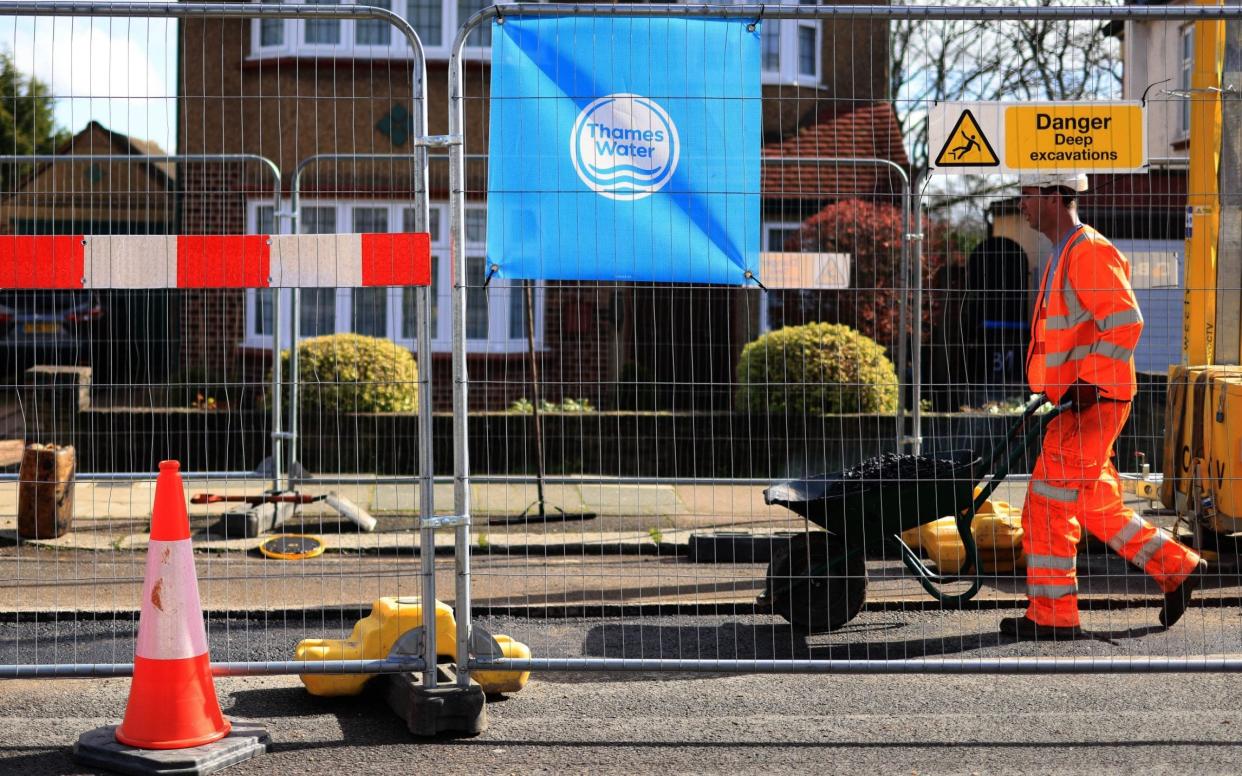 Construction worker on a Thames Water pipe replacement work site