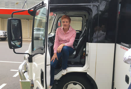 Australian senator Pauline Hanson sits inside the bus she is travelling on in the northern Australian town of Mackay in Queensland, Australia, November 9, 2017. Picture taken November 9, 2017. REUTERS/Jonathan Barrett