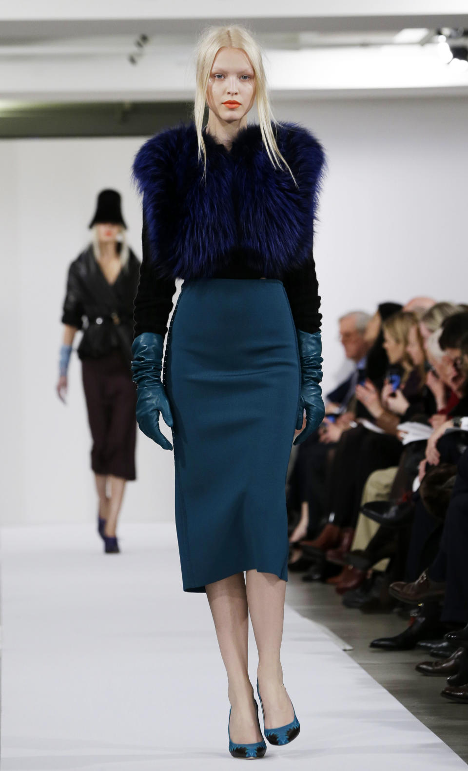 Fashion from the Oscar de la Renta Fall 2013 show is modeled during Fashion Week in New York, Tuesday, Feb. 12, 2013. (AP Photo/Kathy Willens)