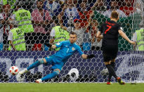 <p>Ivan Rakitic scores the winning penalty to send Croatia through to the semi finals </p>