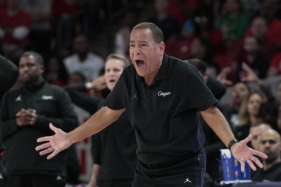 Houston coach Kelvin Sampson reacts to a foul call during the second half of an NCAA college basketball game against Central Florida Saturday, Dec. 31, 2022, in Houston. Houston won 71-65. (AP Photo/David J. Phillip)