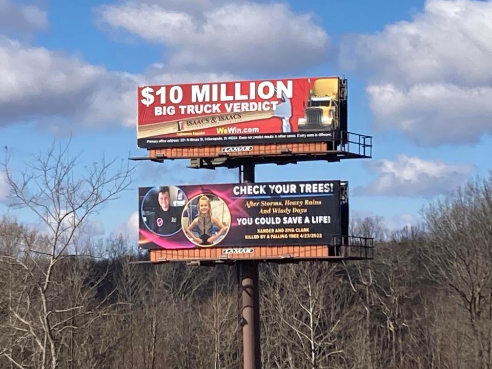 The billboard featuring Alexander and Ziva Clark.