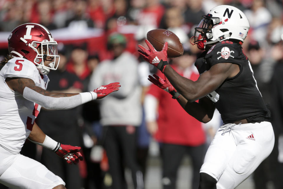 Nebraska wide receiver JD Spielman, right, makes a catch in front of Indiana defensive back Juwan Burgess (5) during the first half of an NCAA college football game in Lincoln, Neb., Saturday, Oct. 26, 2019. (AP Photo/Nati Harnik)