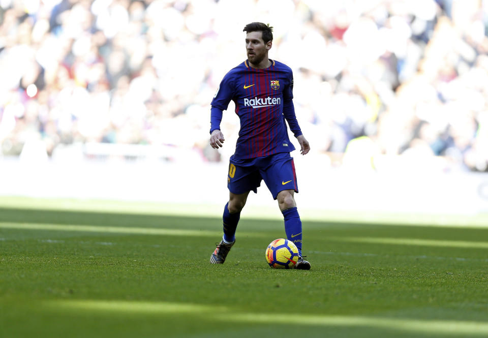 <p>Barcelona’s Lionel Messi controls the ball during the Spanish La Liga soccer match between Real Madrid and Barcelona at the Santiago Bernabeu stadium in Madrid, Spain, Saturday, Dec. 23, 2017. (AP Photo/Francisco Seco) </p>