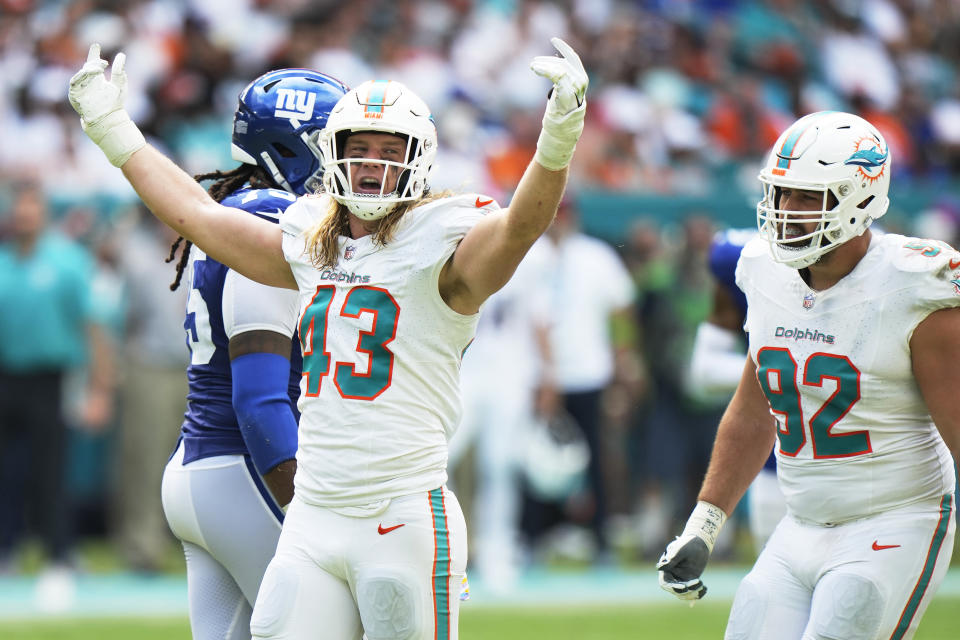 Miami Dolphins linebacker Andrew Van Ginkel (43) celebrates after he sacked New York Giants quarterback Daniel Jones (8) during the second half of an NFL football game, Sunday, Oct. 8, 2023, in Miami Gardens, Fla. (AP Photo/Wilfredo Lee)